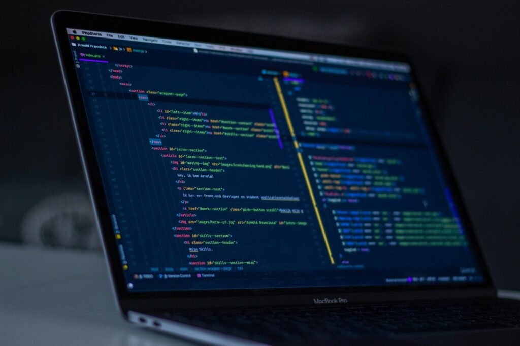 Source code on a developer laptop screen