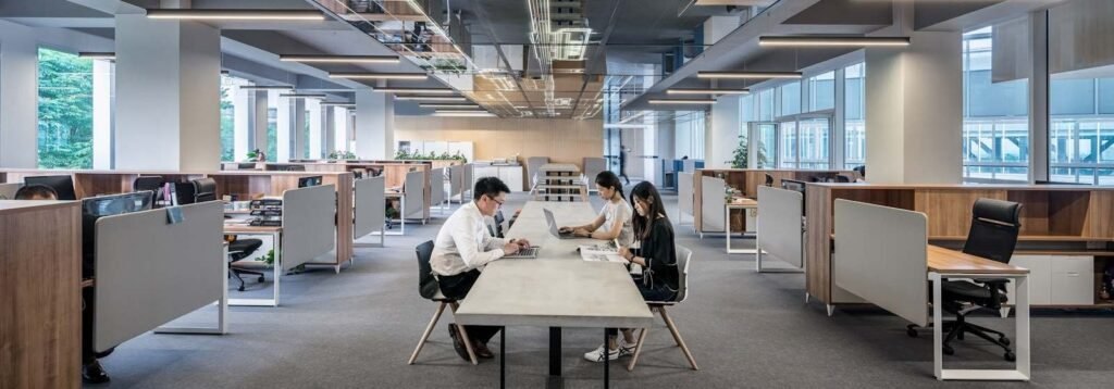 Open-plan office with employees at their workstations